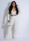 Close-up of a white textured tranquility pant set with intricate patterns and comfortable fabric 