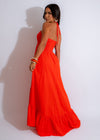 Vibrant and eye-catching maxi dress in orange with a sunset hue and flattering fit