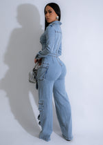  Side view of Street Luxe Cargo Jumpsuit in Light Denim, showcasing relaxed fit and stylish utility design