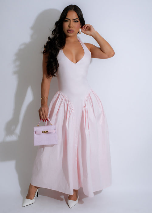 Stunning pink midi dress with flowing fabric and desert-inspired print