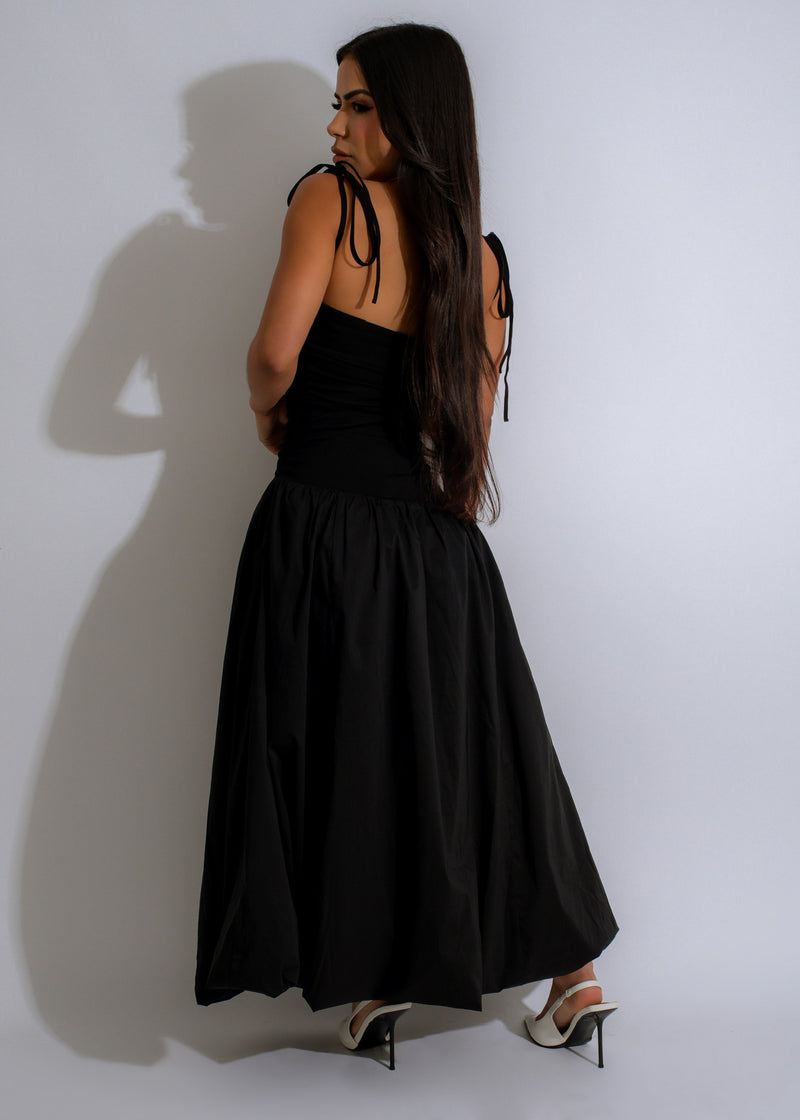 Gorgeous black maxi dress with a flattering silhouette and flowing skirt