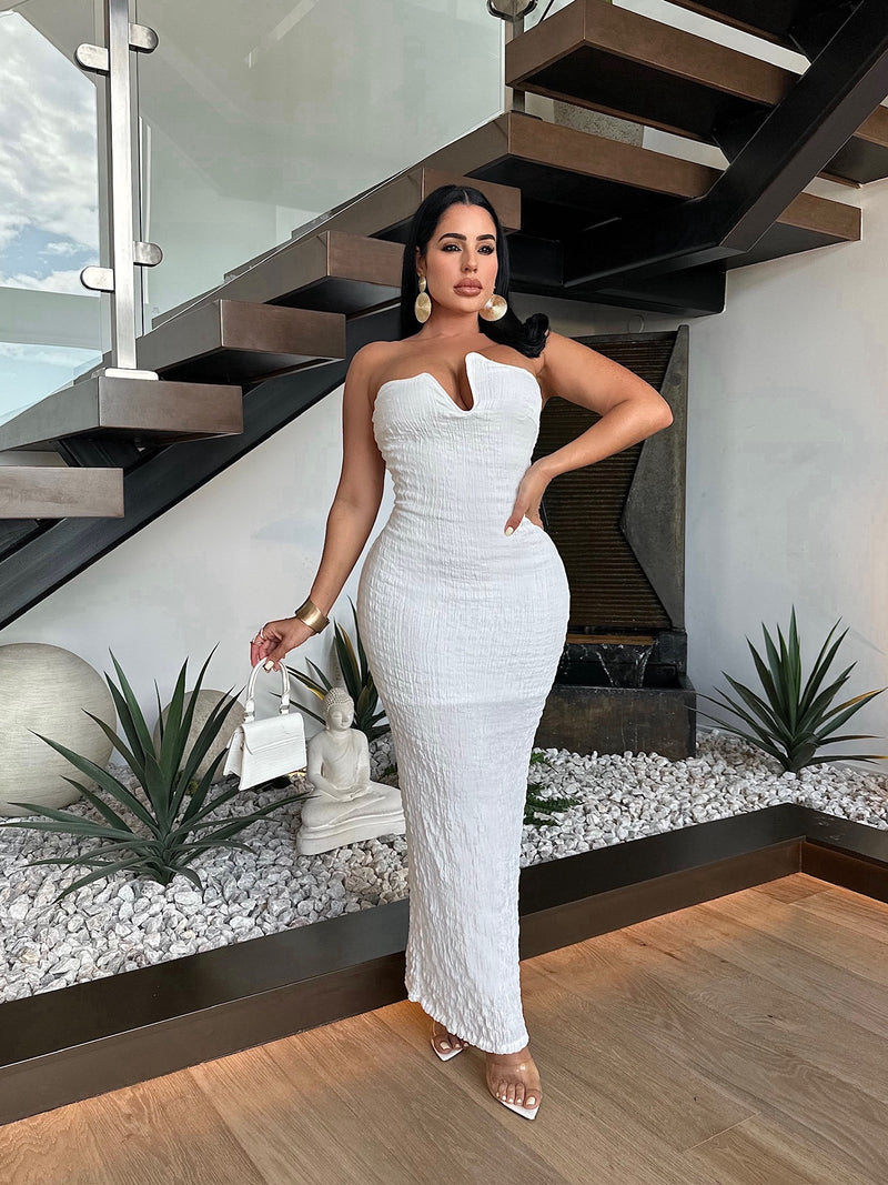 Stunning white dress with eye-catching sequin design and chic midi length