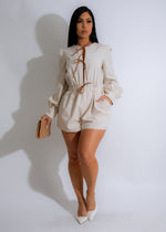 Meadow Breeze Linen Romper Nude - Front view with adjustable straps and button details