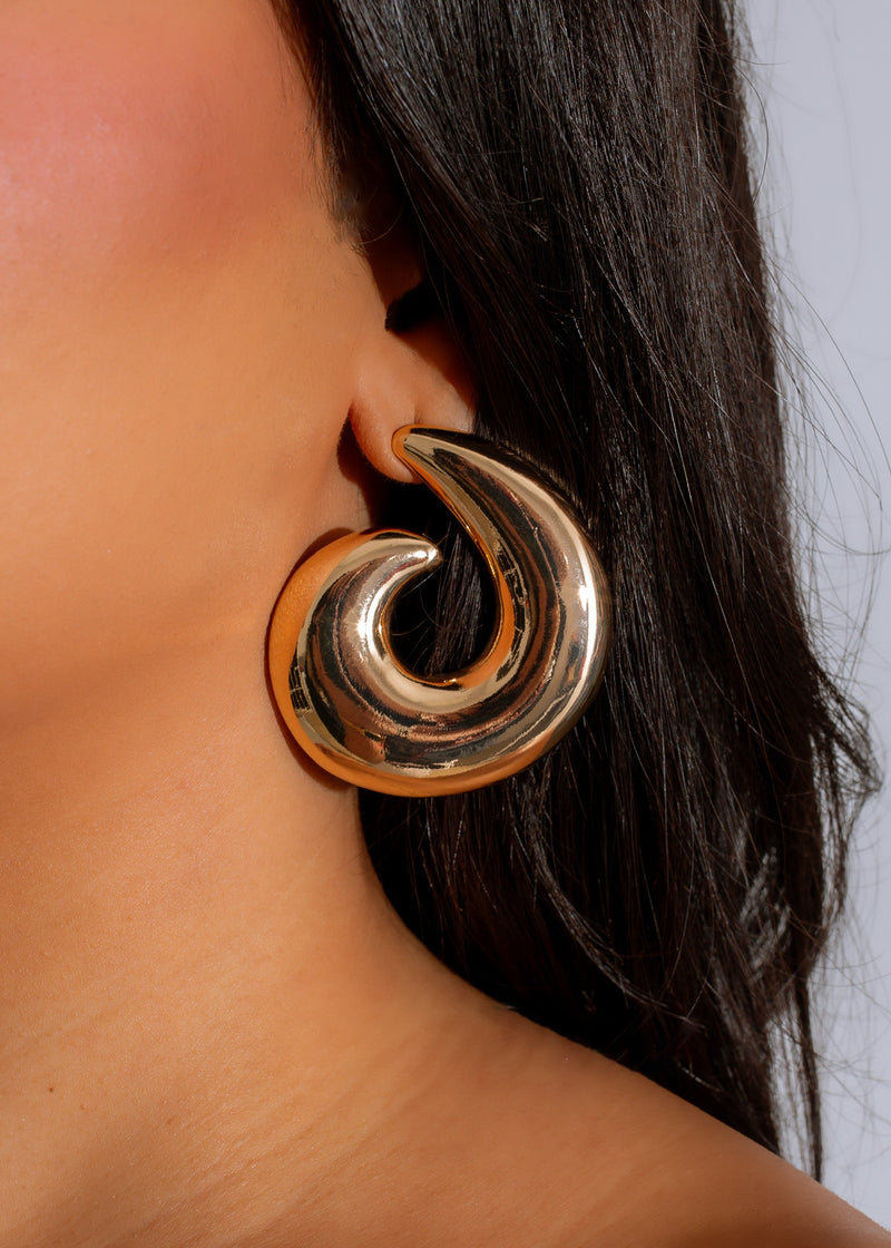 Beautiful and elegant gold Aurora Swirl Earrings, perfect for any occasion