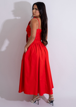  Stunning red midi dress featuring a charming botanical bow design, flattering silhouette, and eye-catching red color, ideal for making a statement at any gathering or celebration