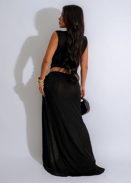 Close-up of Scarlet Passion Maxi Dress Black, showing off the elegant lace design and flowing silhouette