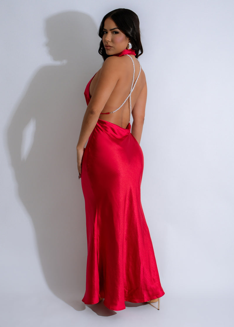 Long elegant red satin maxi dress with luminous pearl detailing 