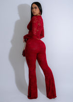 Red lace pant set with midnight ruffle details, perfect for nighttime glamour