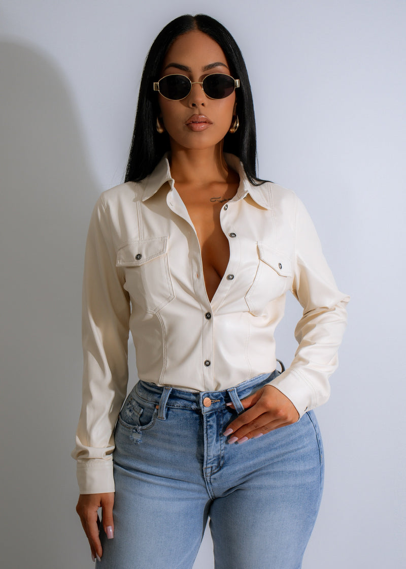 Iconic Attitude Faux Leather Long Top in Nude, featuring a sleek and stylish design with a flattering fit and high-quality faux leather material