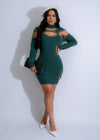 Close-up of green knit mini dress with linked allure design and ribbed texture