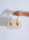 Stylish Ethereal Grip Handbag Nude, a sleek and versatile accessory