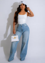  Woman wearing Classic Wide-Strap Crop Top White with high-waisted jeans