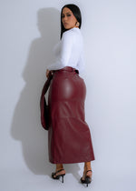 Stylish woman wearing red faux leather skirt with utility pockets