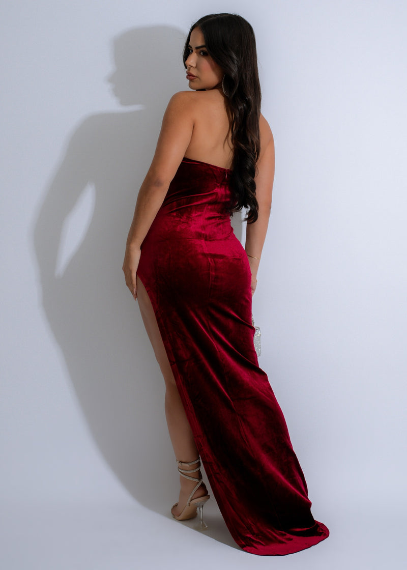 Beautiful red maxi dress with intricate rhinestone embellishments and soft, opulent velvet material