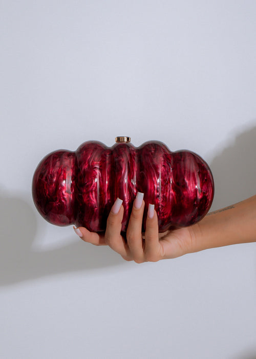 Sculpted Cloud Clutch Red with luxurious red velvet fabric and elegant gold chain strap