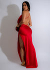 Model wearing the Moonlit Satin Slip Maxi Dress Red, showcasing its flowing silhouette and plunging neckline