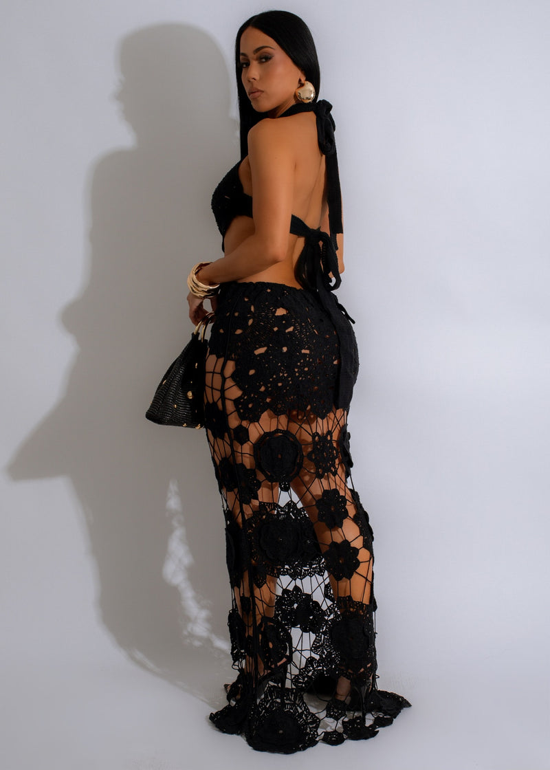 Beautiful black crochet maxi dress with stunning gold accents for special occasions