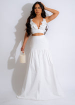 Alt text: Blossom Elegance Skirt Set White, a stunning two-piece outfit featuring a floral-patterned skirt and matching top, perfect for a sophisticated and elegant look