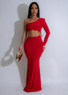 Ember Flow Maxi Dress Red on a model walking through a garden