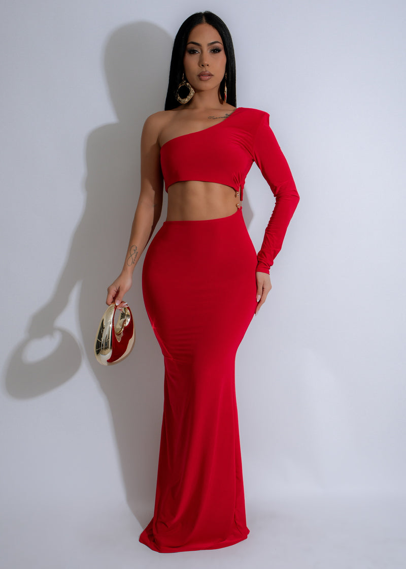 Ember Flow Maxi Dress Red on a model walking through a garden