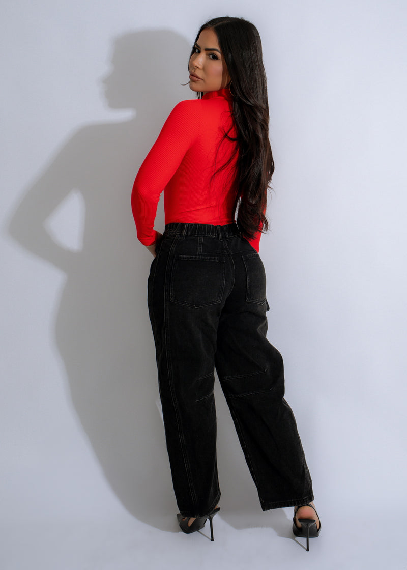 Red bodysuit with contoured design and ribbed texture for a sleek look