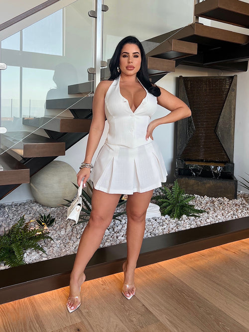 A flattering and chic white mini dress with a comfortable fit