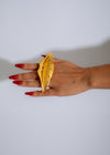 Handcrafted Solaris Lips Statement Ring in radiant gold with intricate detailing