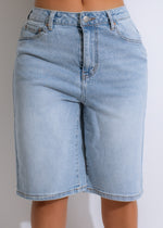  Close-up of Sunset Boulevard Shorts Light Denim, showing the distressed details and frayed hem