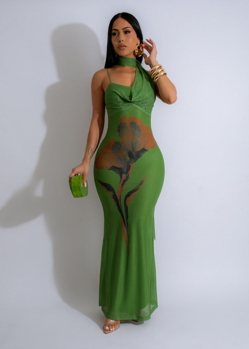 Stunning green mesh maxi dress with intricate detailing and flattering silhouette for a bold and elegant look