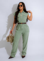 Sage utility jumpsuit in a beautiful shade of green with multiple pockets and a comfortable fit