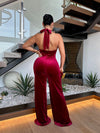 Velvet Nights Jumpsuit Red in elegant evening setting with accessories