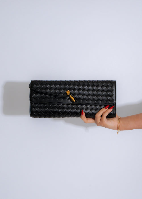 Handcrafted black woven leather handbag with stylish and elegant design