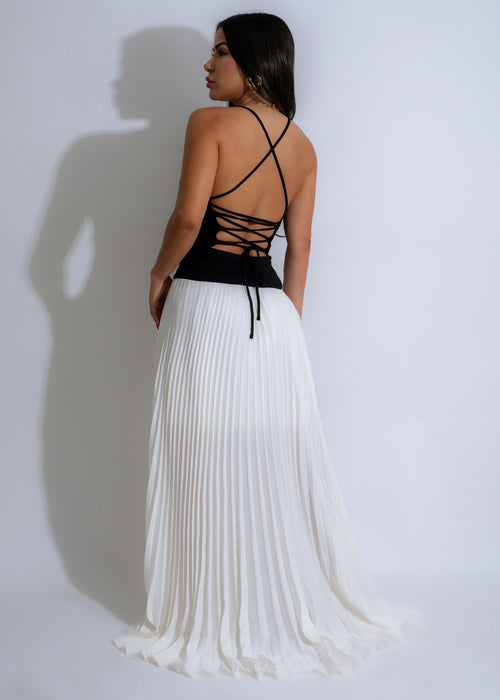 White ribbed maxi dress with a flowy silhouette, perfect for summer nights