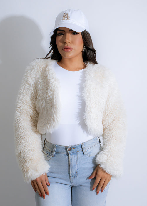 Long-haired white faux fur jacket with a cozy and stylish look