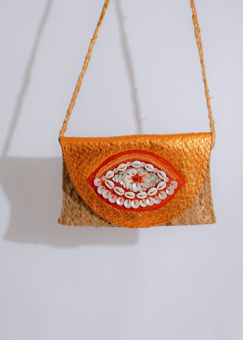 Stylish and vibrant handbag in orange, perfect for summer adventures