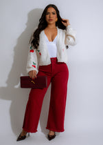 High-waisted Sable Flare Jeans in bold red, perfect for making a statement