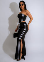 Two-piece matching set featuring a black crop top and high-waisted pants