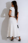  The Most Wanted Skirt Set White - Side View, showcasing the flattering fit and elegant design