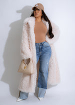 Arctic Bliss white coat with faux fur trim, perfect for winter