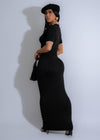  A side view of the Classic Charm Polo Maxi Dress Black, showcasing its flattering silhouette and high-quality fabric, perfect for formal events or casual outings