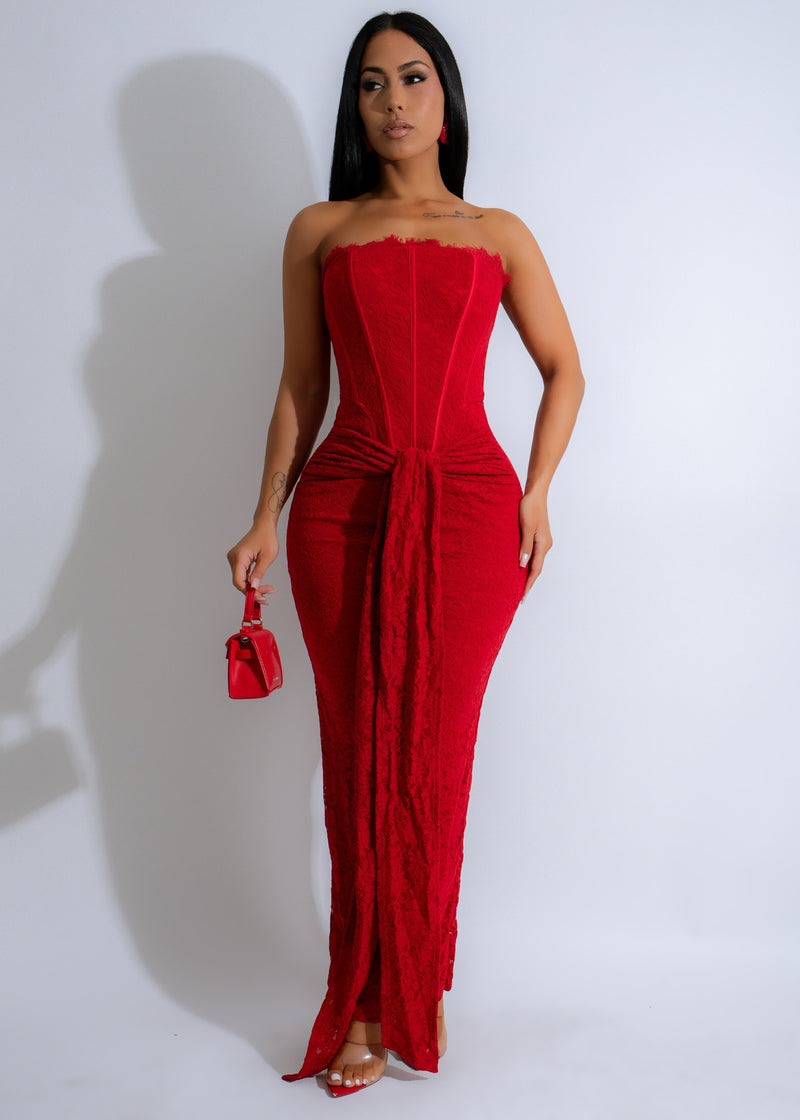 Stunning red lace maxi dress with intricate details and flowing silhouette