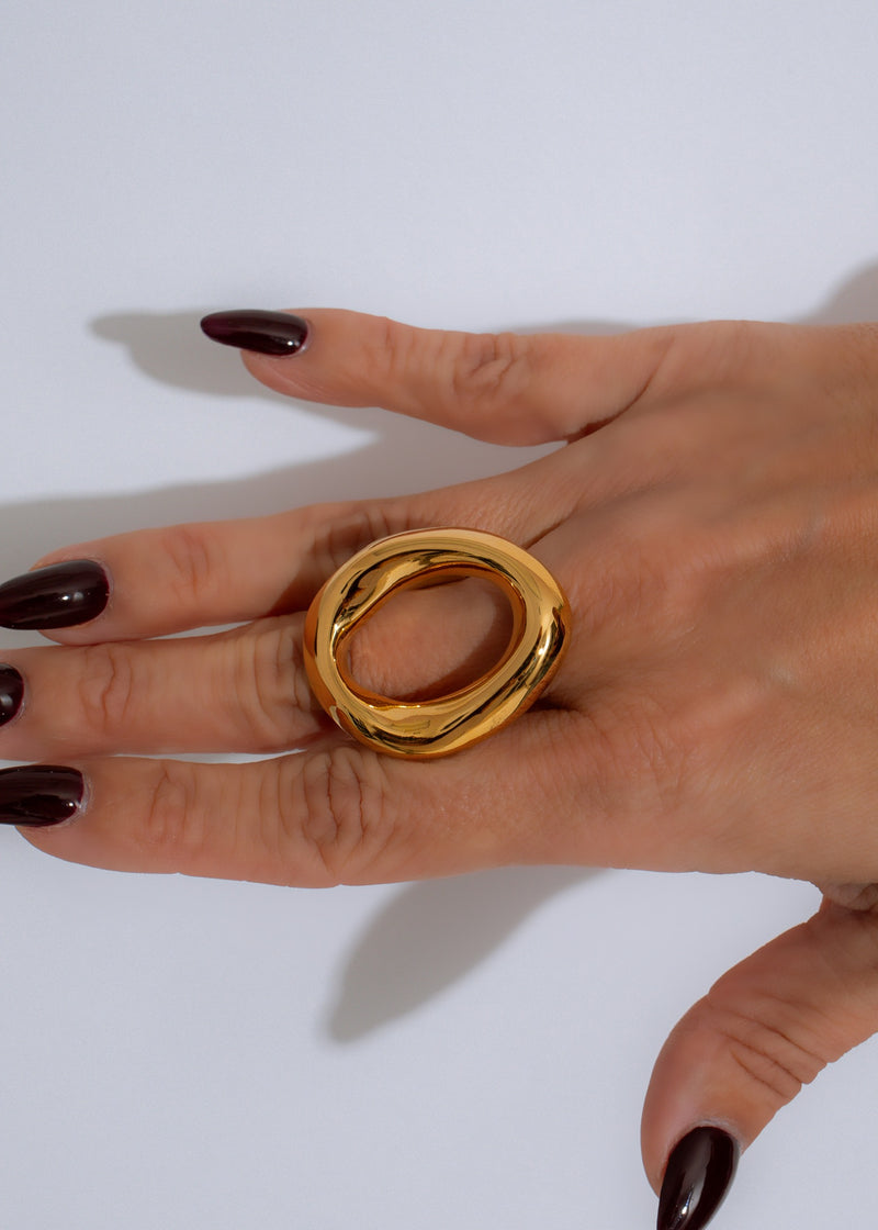 Shimmering gold infinity wave ring, a timeless and elegant accessory