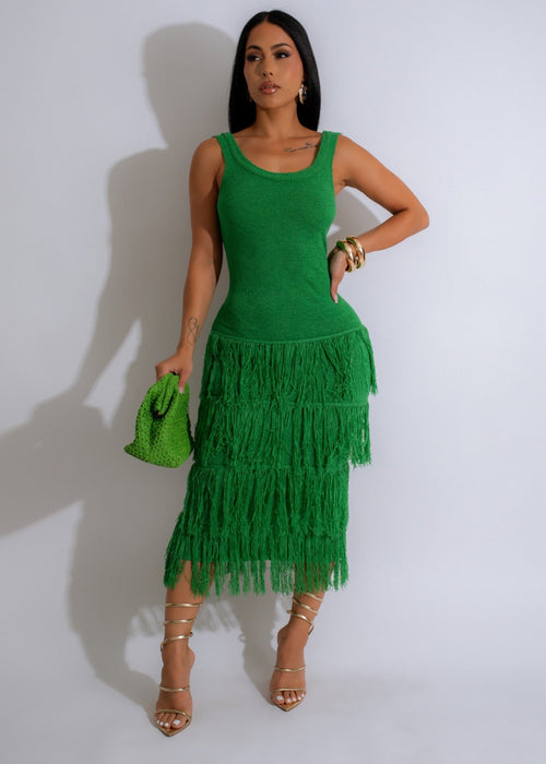 Verdant Cascade Fringe Knit Midi Dress Green, a stylish and elegant green dress with beautiful fringe details and a flattering midi length 