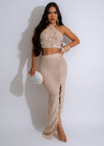 Alt text: A beautiful crochet skirt set in nude color, featuring a delicate design with a high-waisted skirt and matching top