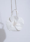 The Petal Perfection Handbag White, a chic and sophisticated accessory with intricate petal-inspired embellishments and a classic white color that complements any look