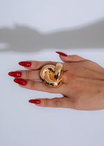 Close-up of Swirl of Elegance Ring in Gold with Intricate Detailing and Sparkling Gemstones