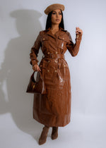 Front view of the Obsidian Luxe Faux Leather Coat in rich brown color with elegant stitching and luxurious texture