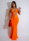 Beautiful Sunset Goddess Ruched Maxi Dress in Vibrant Orange Color with Flowy and Elegant Design Perfect for Summer Parties and Beach Vacations