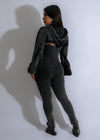 Fashionable and versatile black jumpsuit with ribbed texture and wide leg silhouette