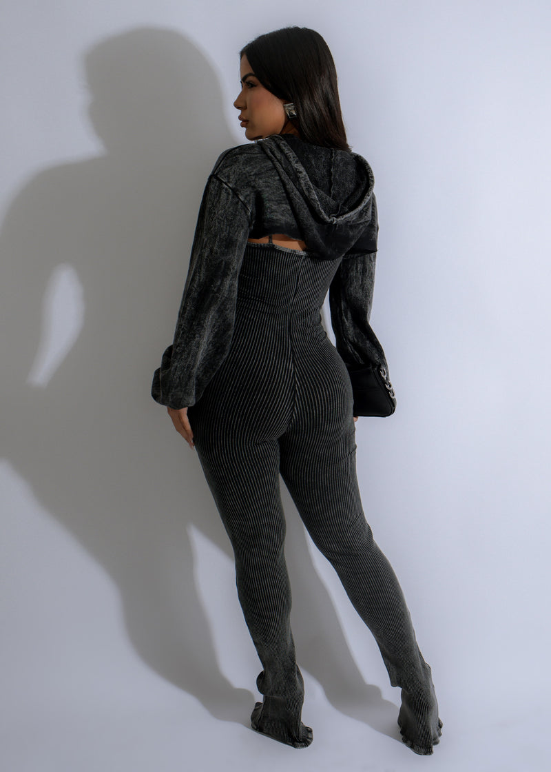 Fashionable and versatile black jumpsuit with ribbed texture and wide leg silhouette